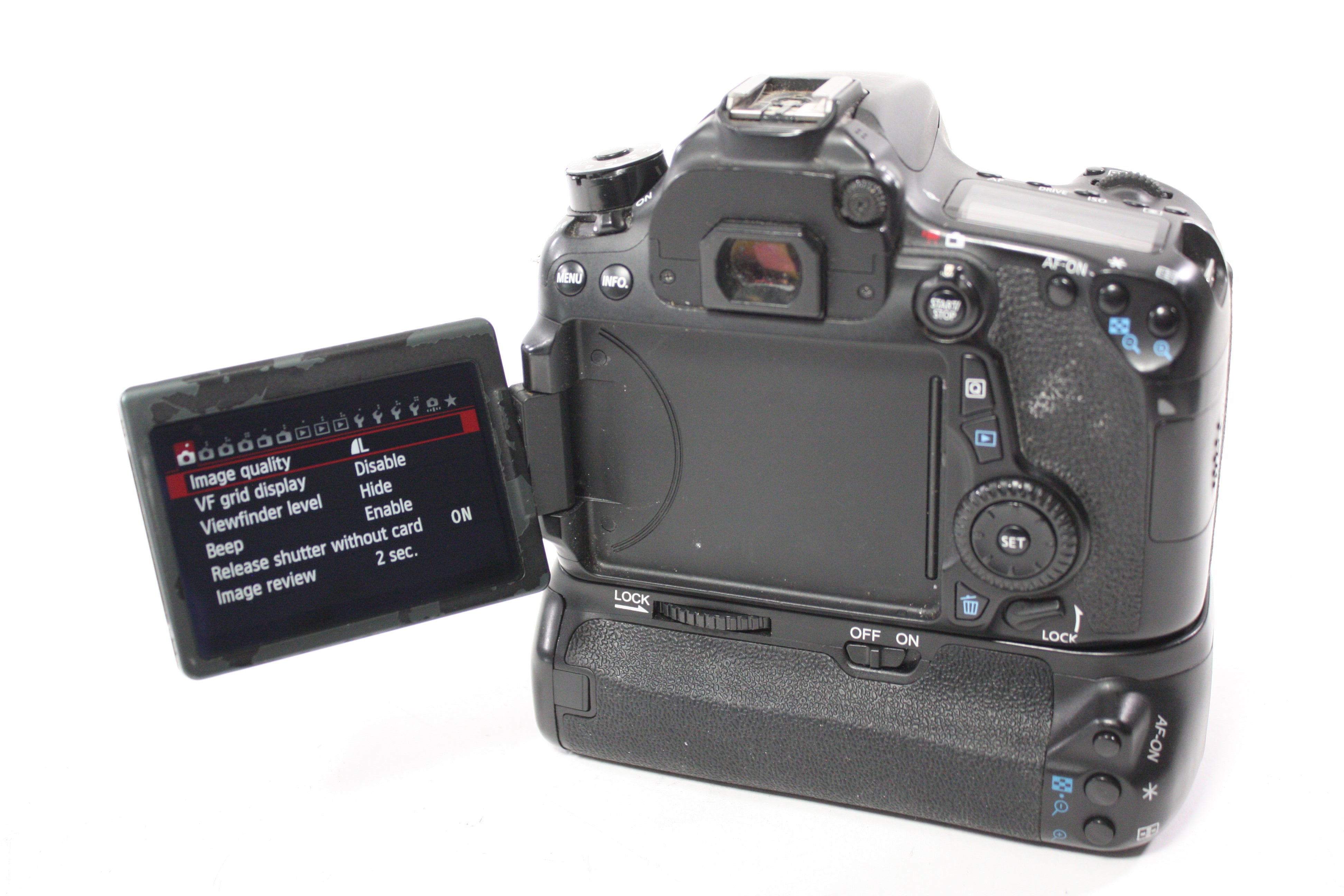 Canon 70D DSLR Camera Body with Shutter Count 31,469 With Meike MK-70D Grip (Please Read)