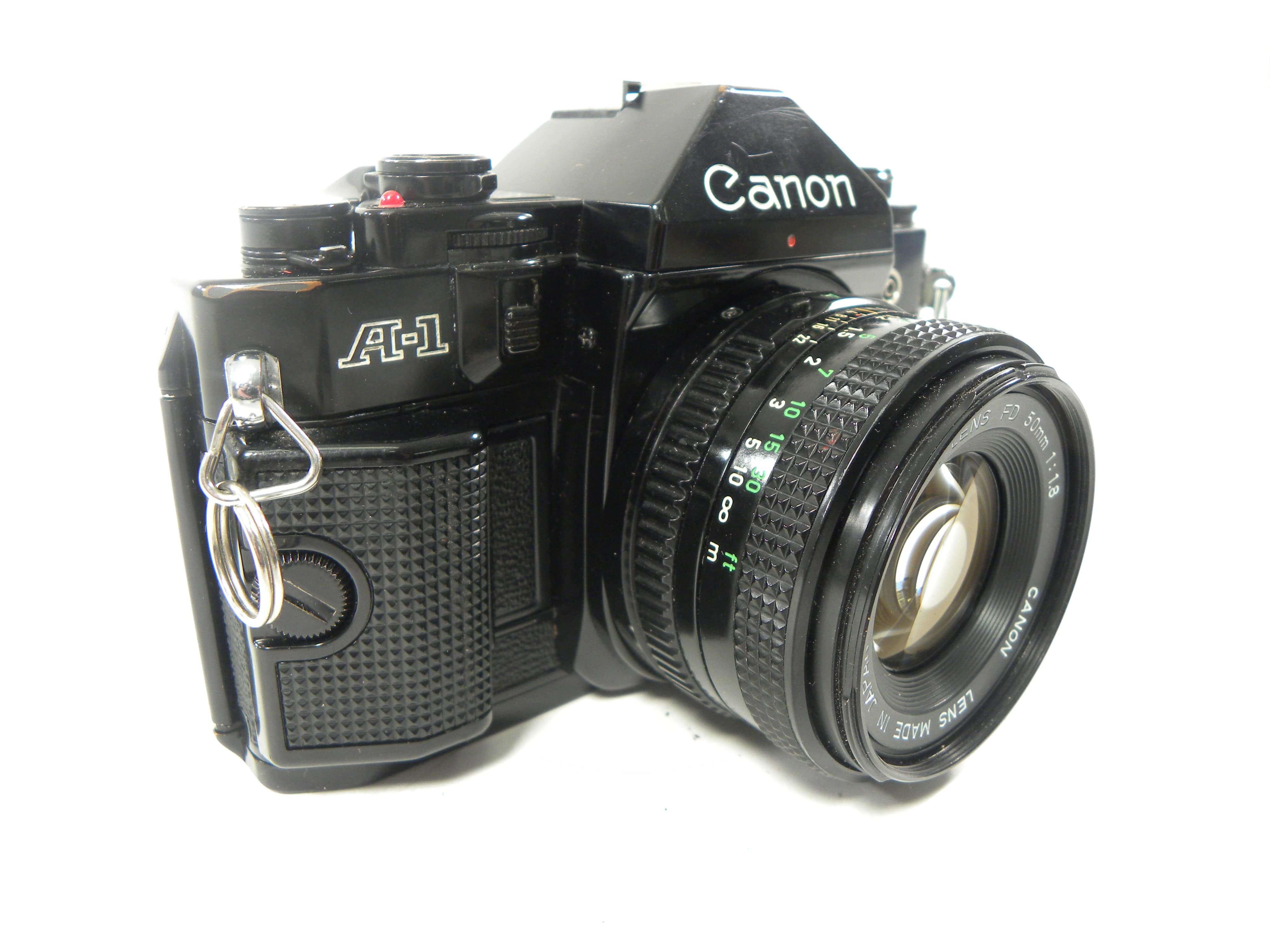 Canon A-1 35mm SLR w/FD 50mm f1.8 (Black)