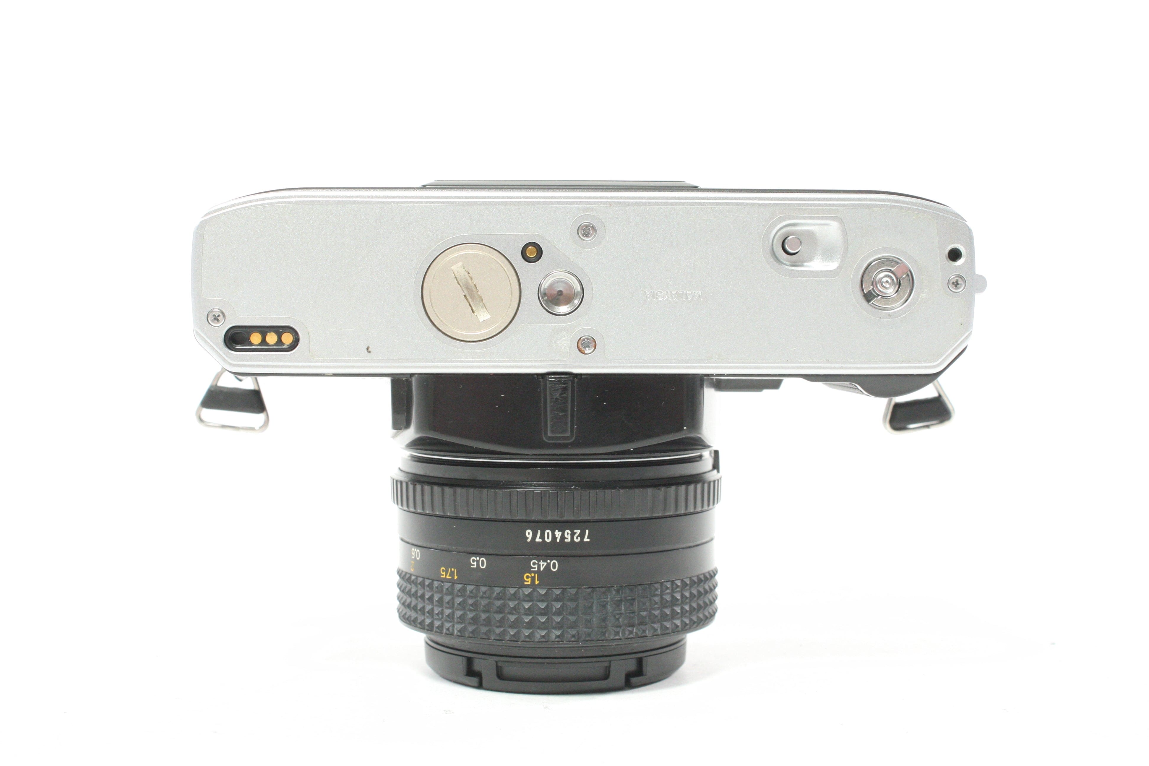 Minolta X-370 35mm SLR Camera with 50mm f/1.7 Lens
