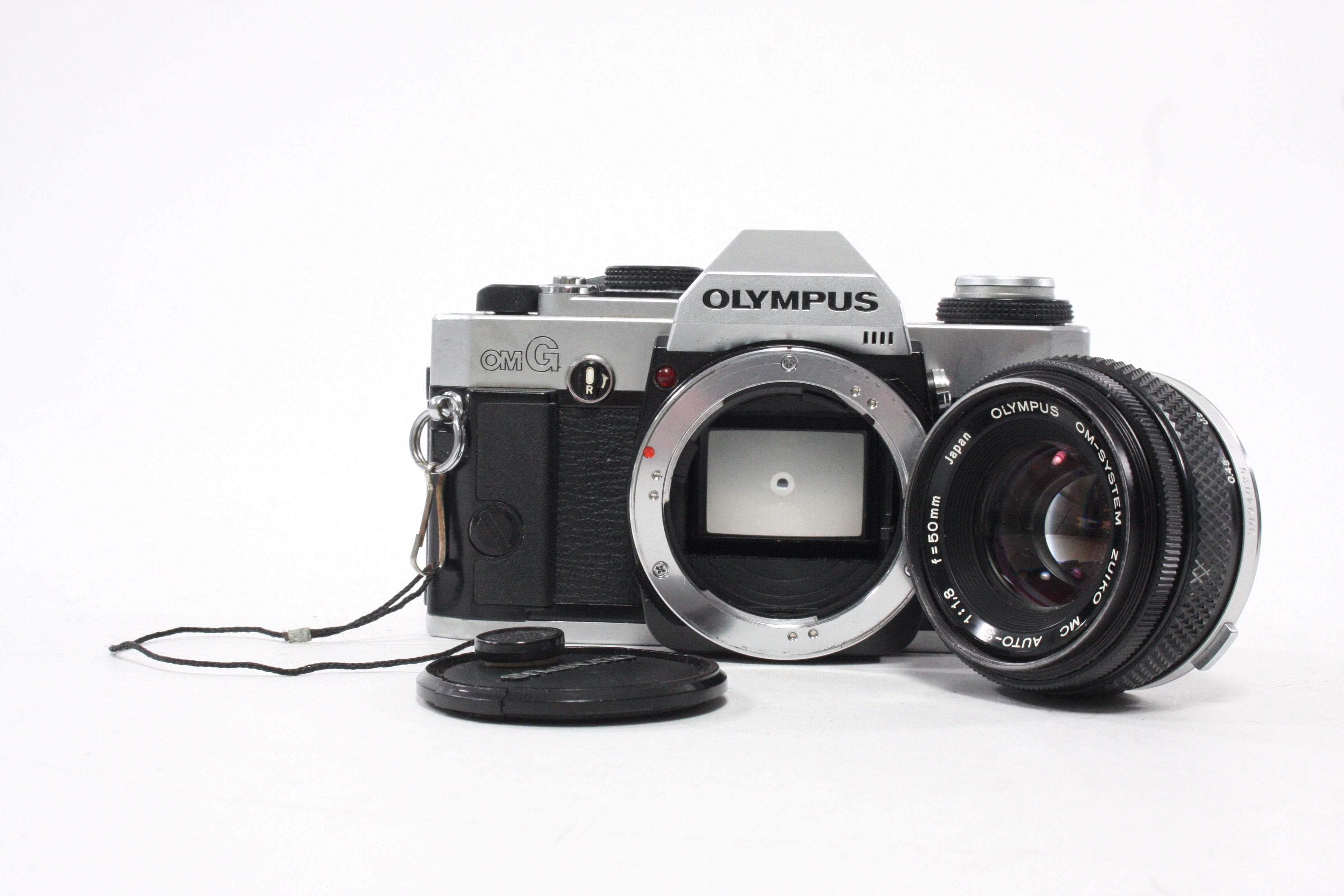 Olympus OMG 35mm SLR Camera with 50mm f/1.8 Lens
