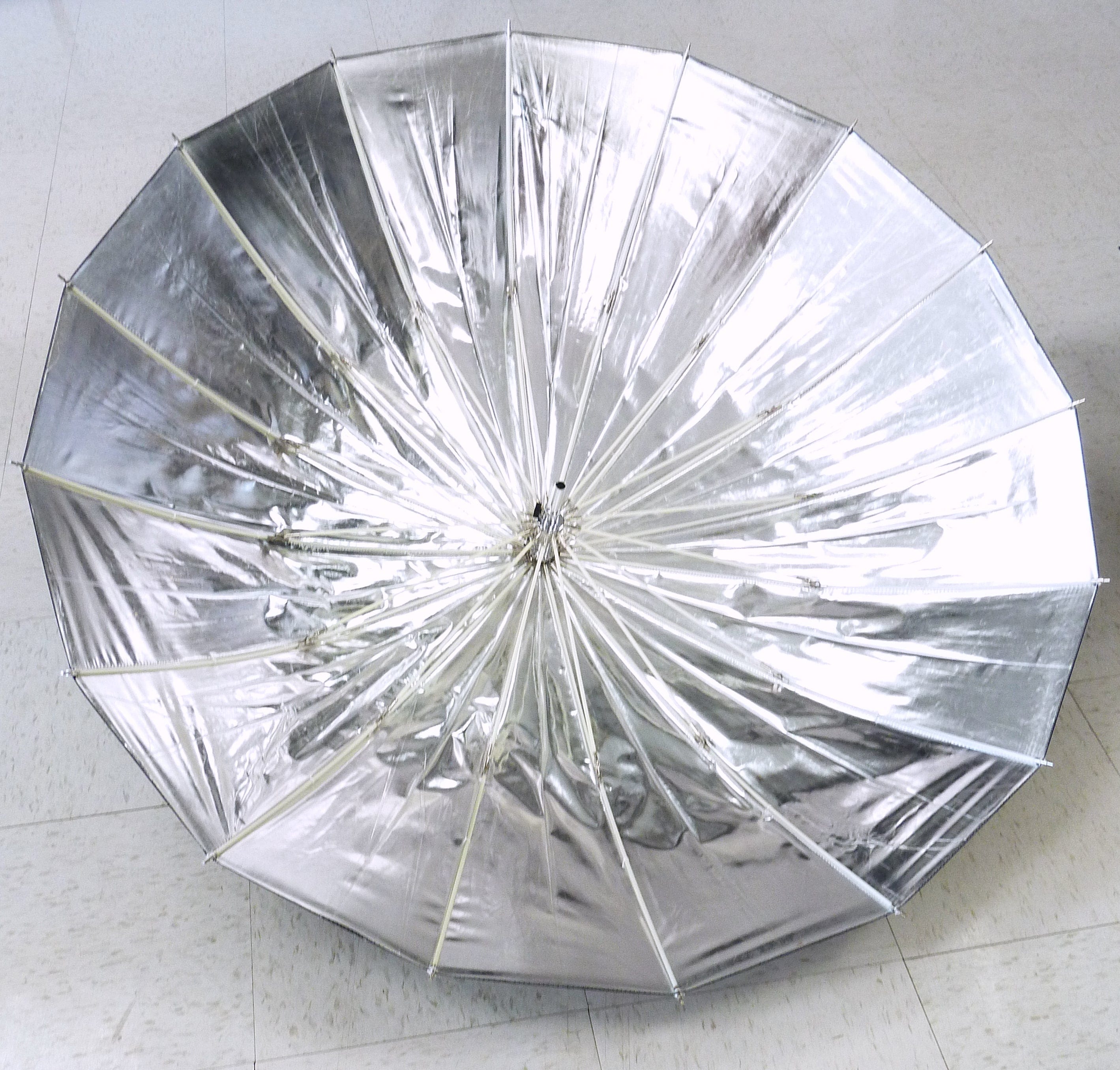 Paul C. Buff PLM 51 Bright Silver Umbrella with diffusion fabric , Strobe holder and Black Spill