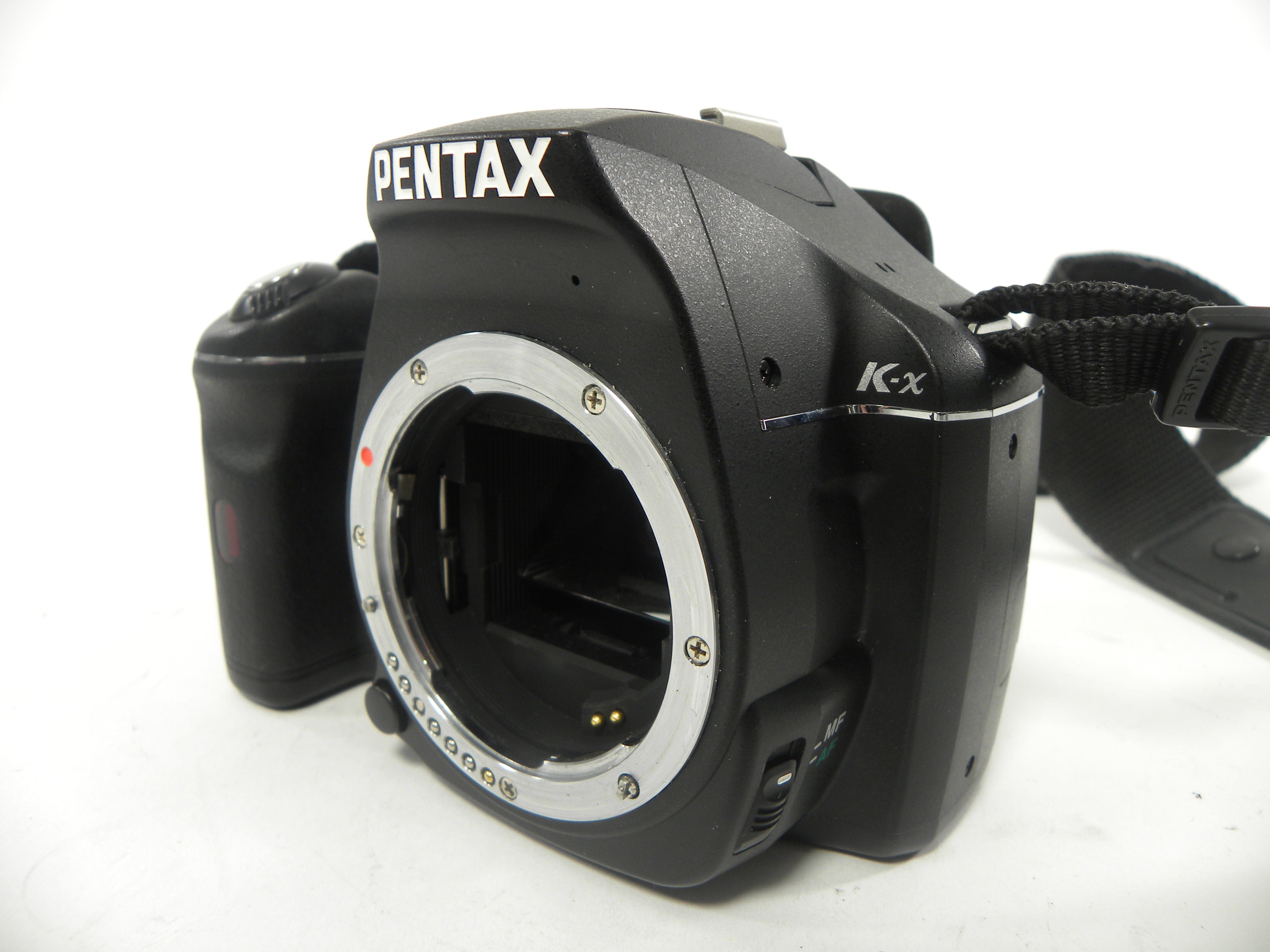 Pentax K-X 12.4mp Digital SLR body only Shutter Ct. 7,699