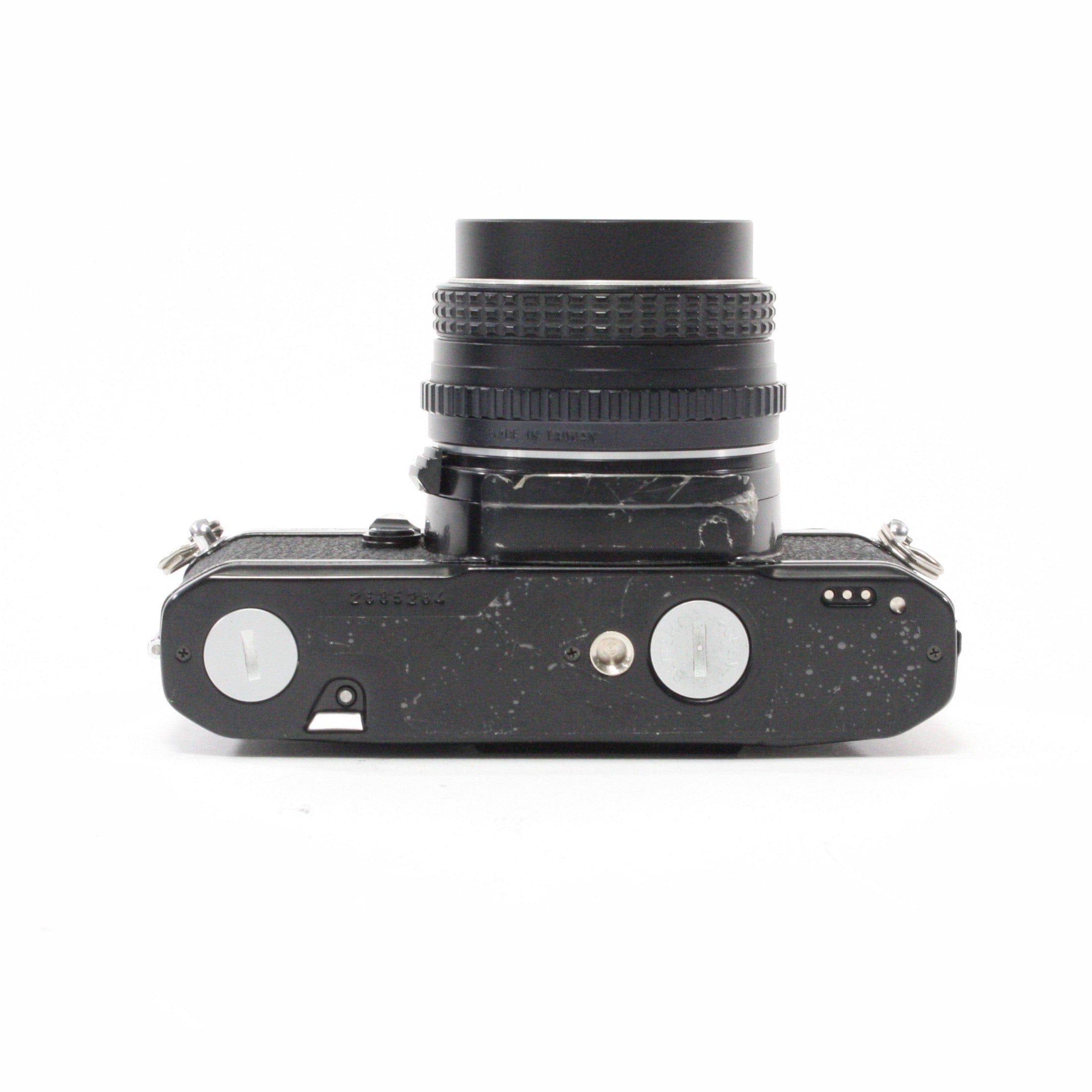 Pentax MV1 with a 50mm f/2 lens.