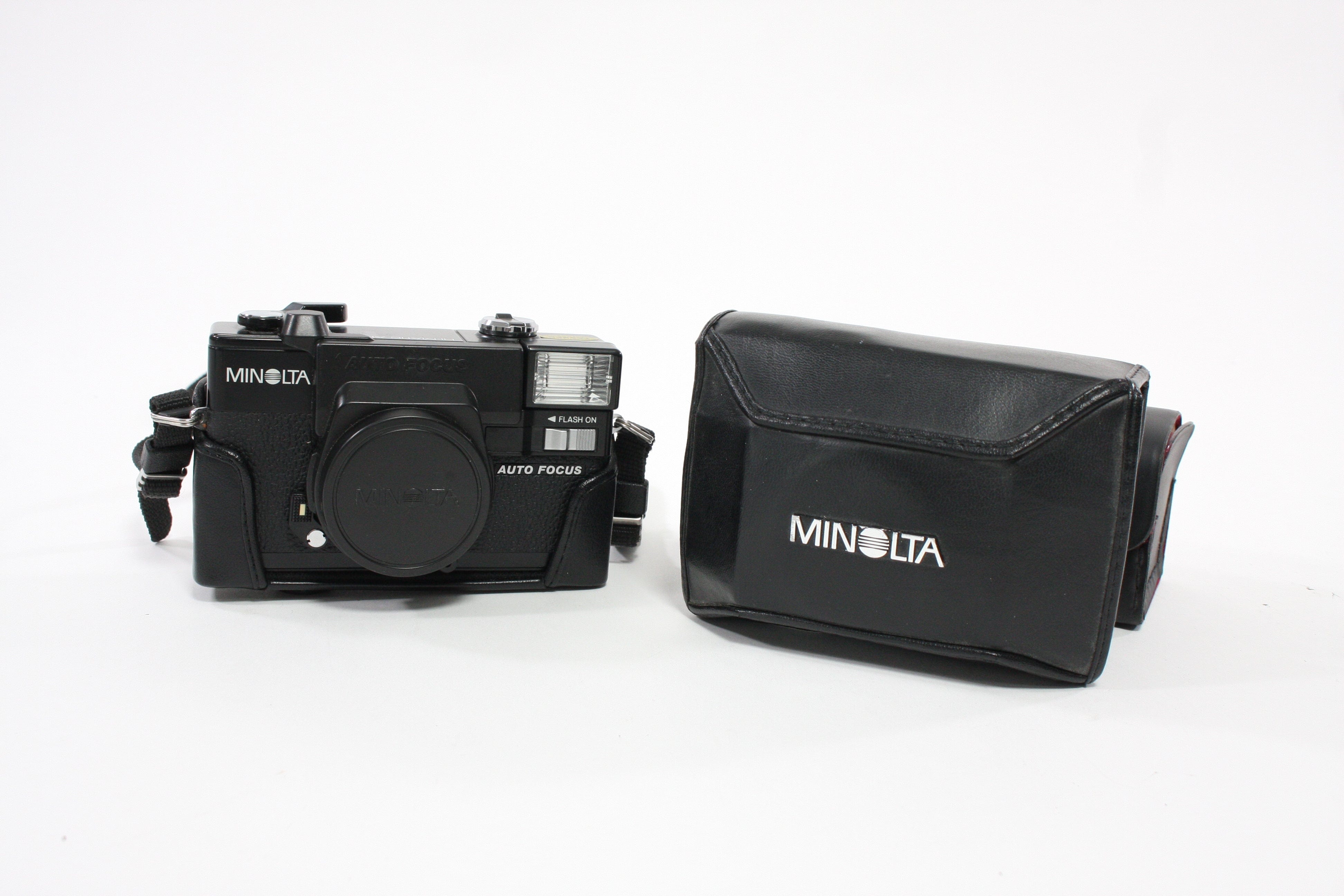 Minolta Hi-Matic AF2 with Case and Auxillary Lens