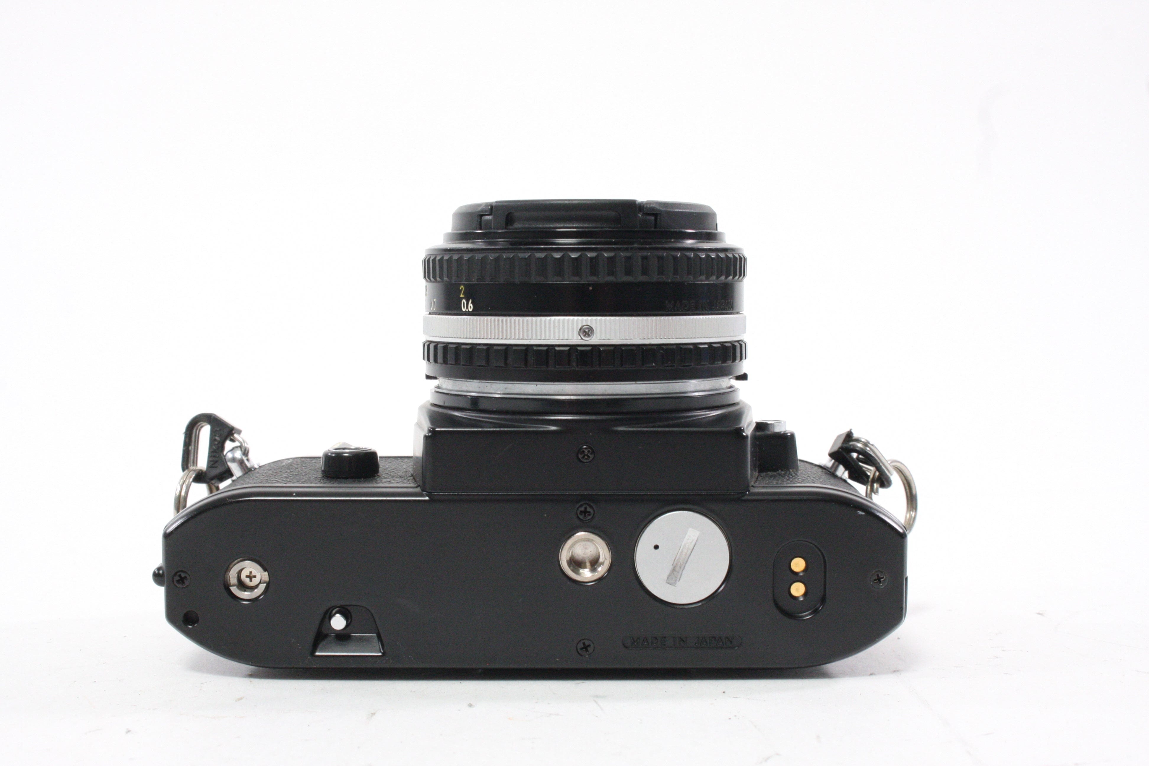 Nikon EM 35mm Camera with 50mm f/1.8 E Series Lens