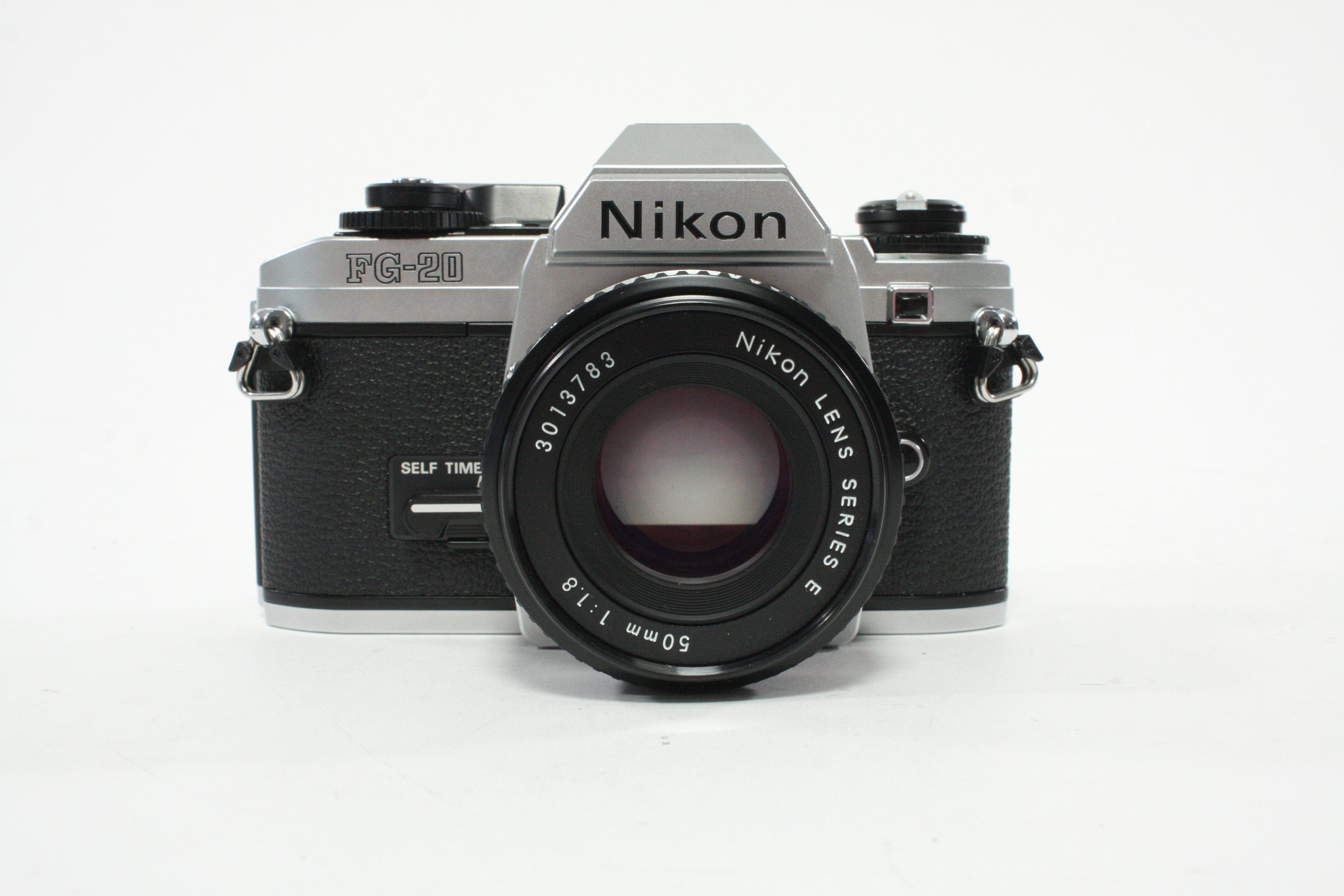 Nikon FG-20 35mm SLR Camera with 50mm f/1.8 E Series F-Mount Lens