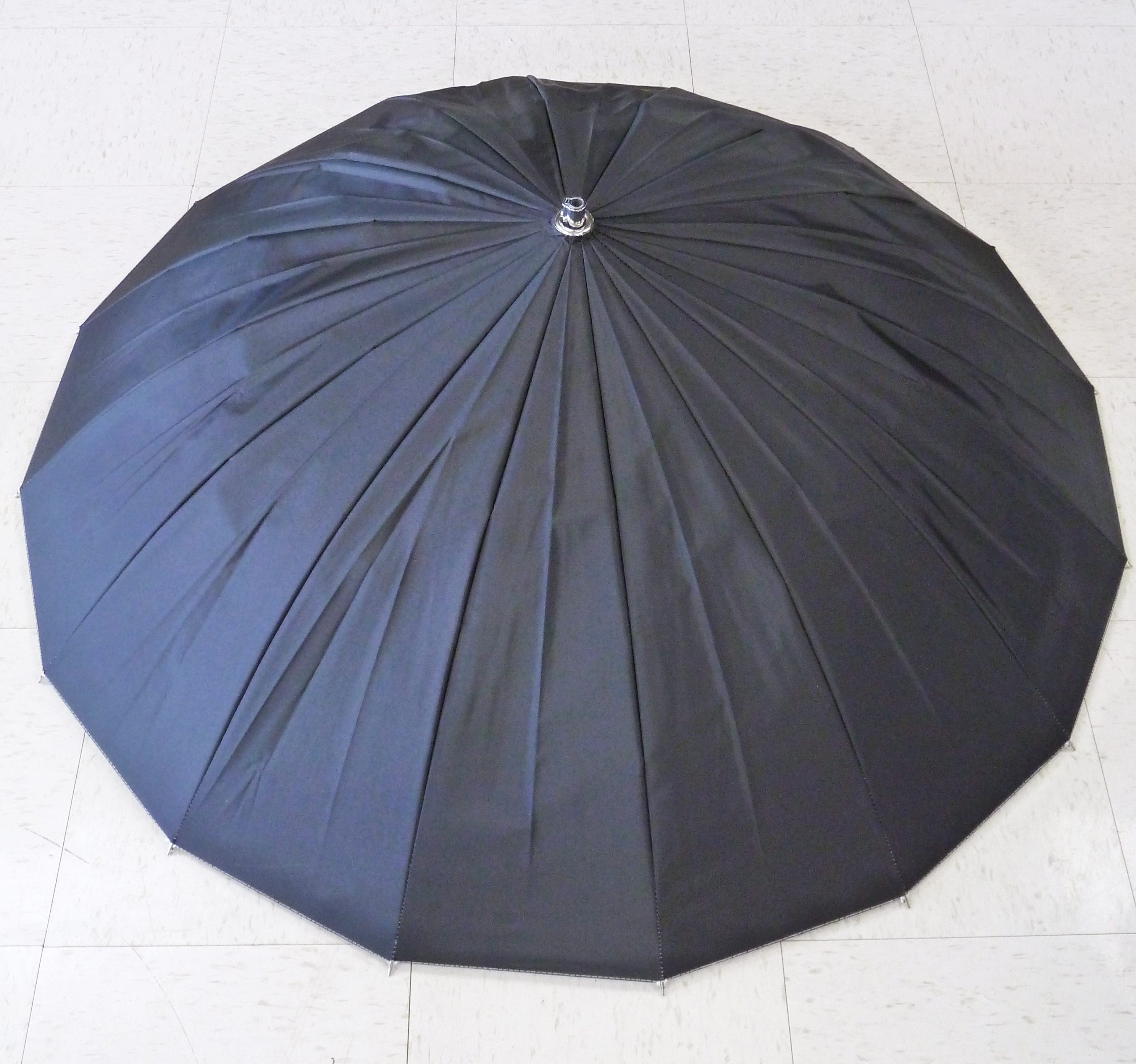 Paul C. Buff PLM 51 Bright Silver Umbrella with diffusion fabric , Strobe holder and Black Spill