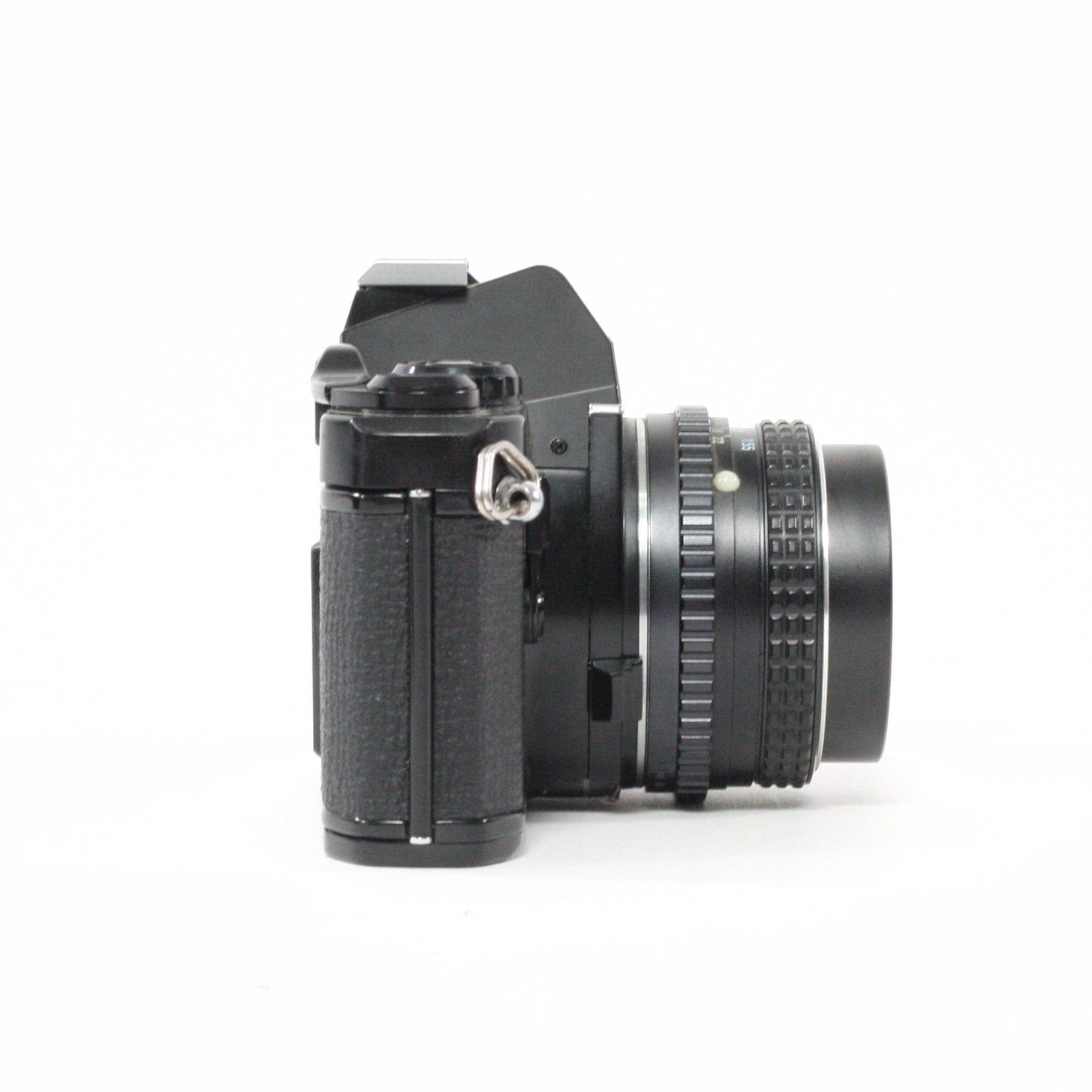 Pentax MV1 with a 50mm f/2 lens.