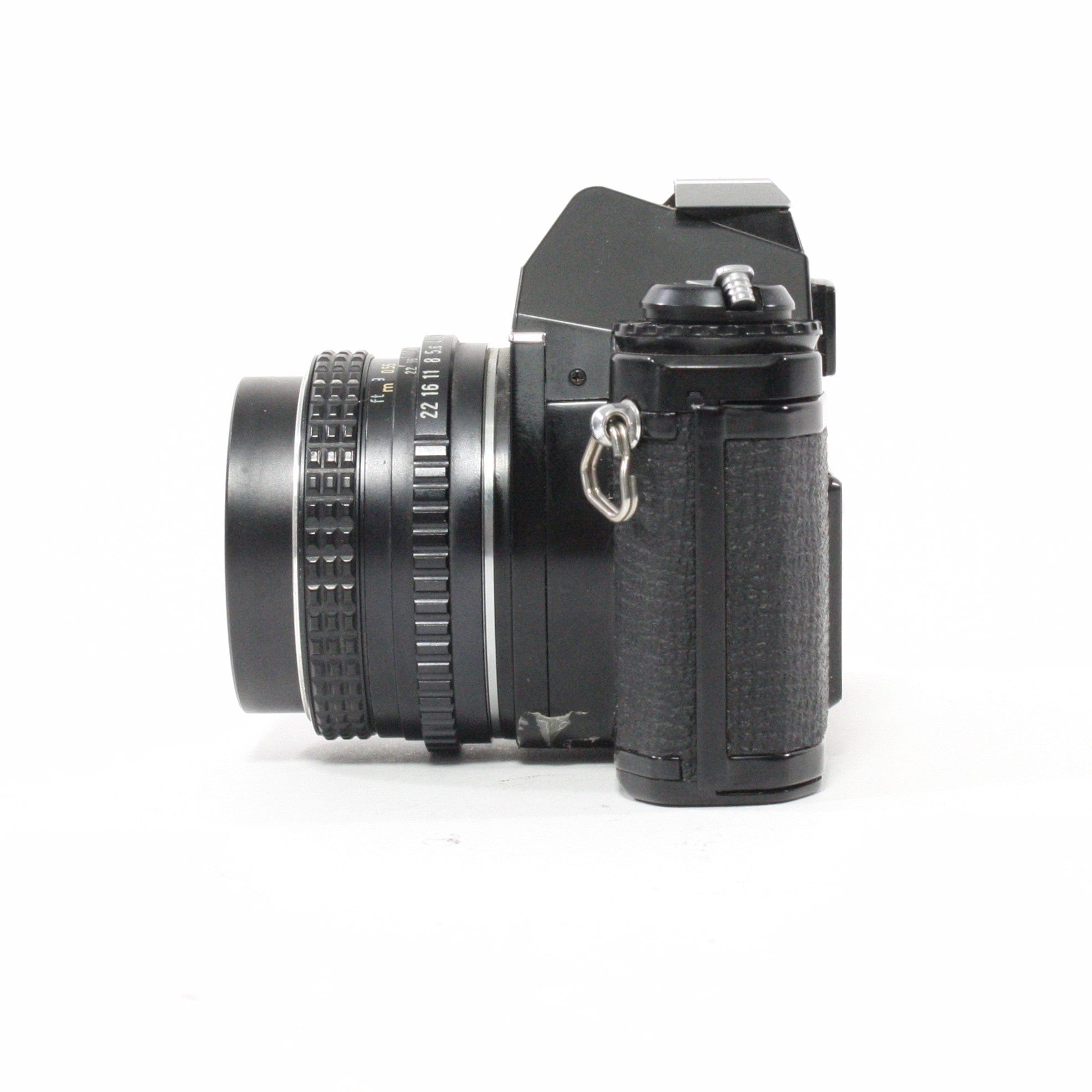 Pentax MV1 with a 50mm f/2 lens.