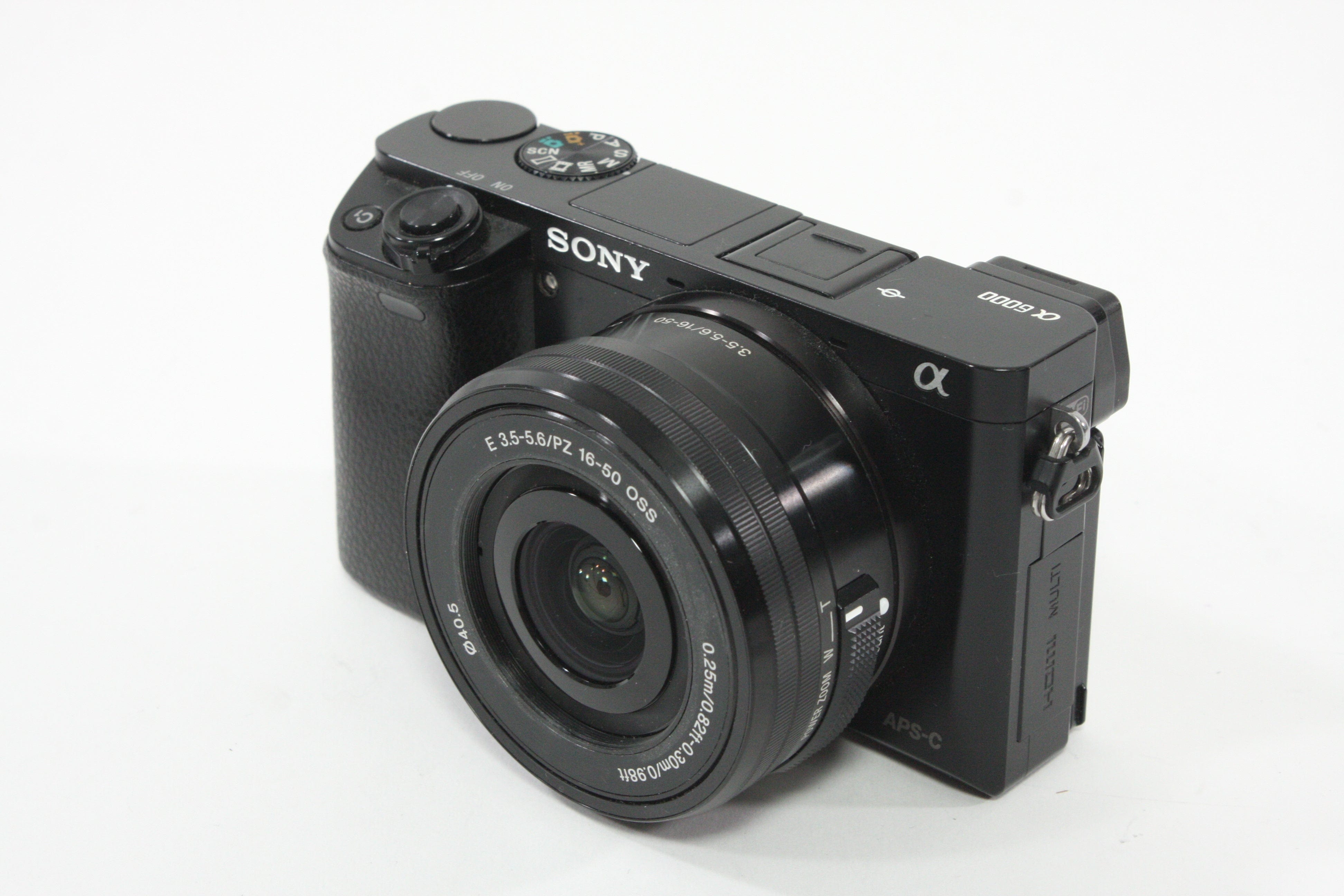 Sony a6000 w/16-60mm F3.5-5.6 Lens + SmallRig Cage and Battery Grip - Shutter Count 7307